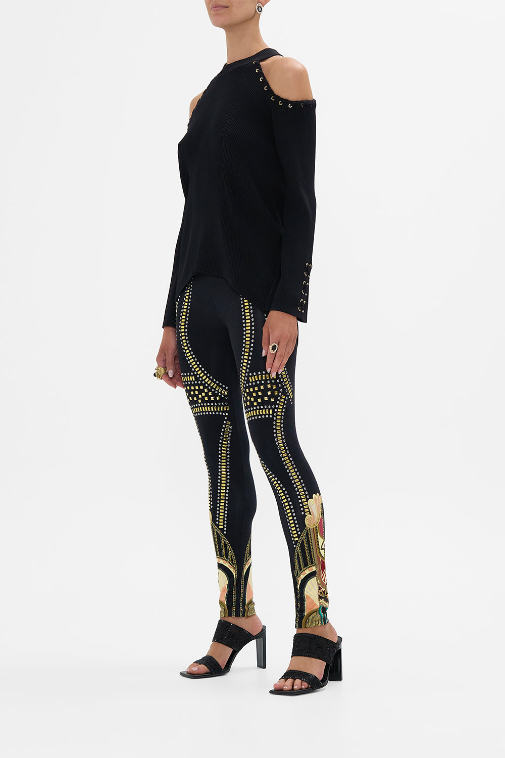 The CAMILLA COLD SHOULDER FLARED SLEEVE KNIT THEY CALLED HER NEFERTARI in our  print.