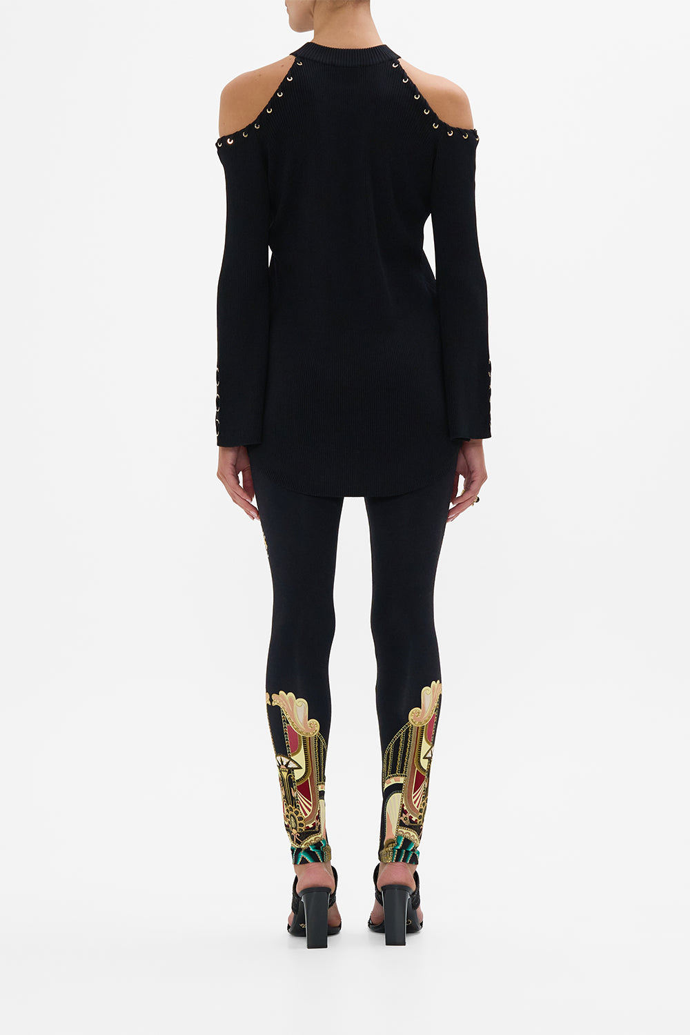 The CAMILLA COLD SHOULDER FLARED SLEEVE KNIT THEY CALLED HER NEFERTARI in our  print.