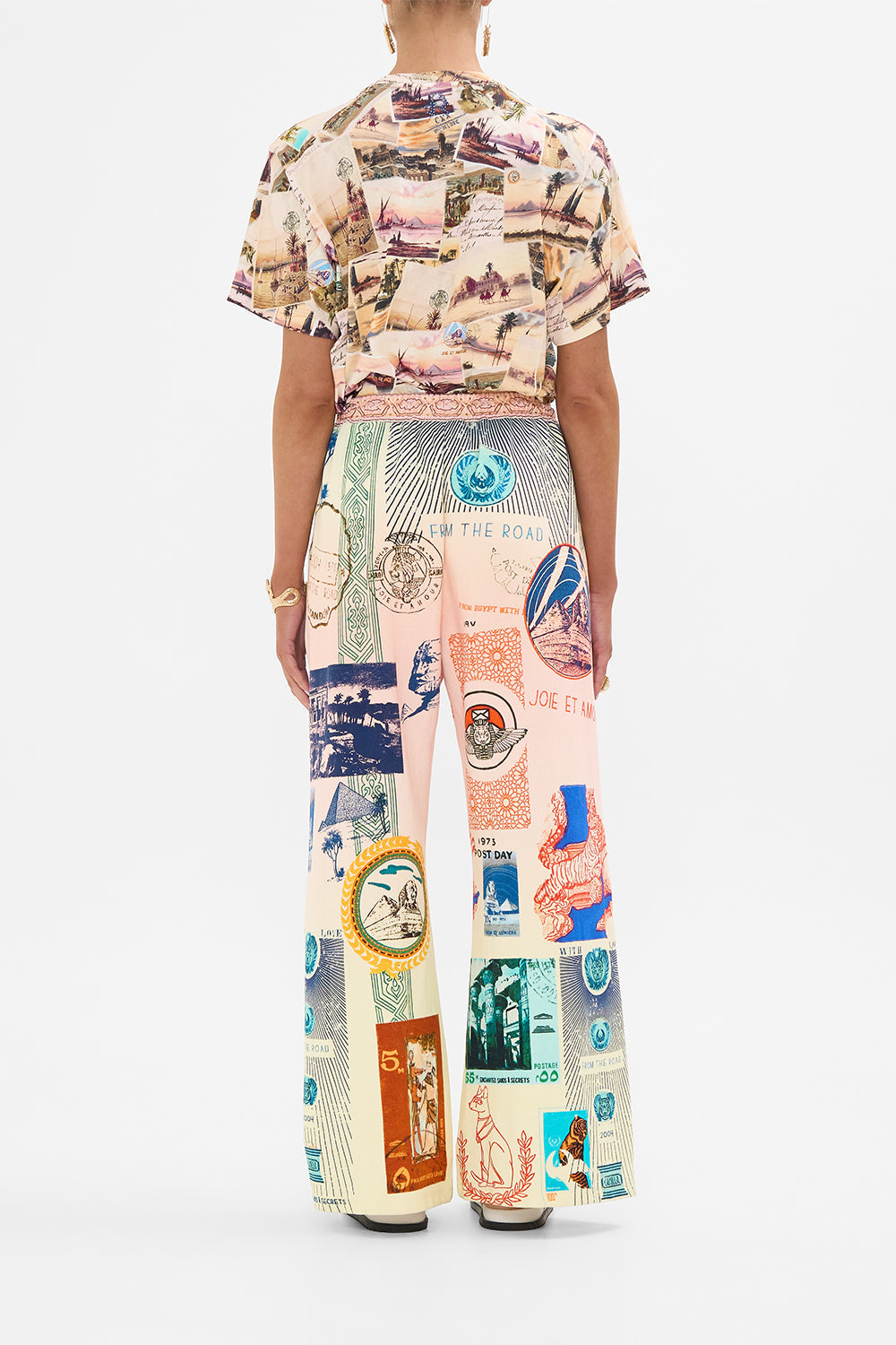 CAMILLA blush straight leg track pant in Haute Passport print. 