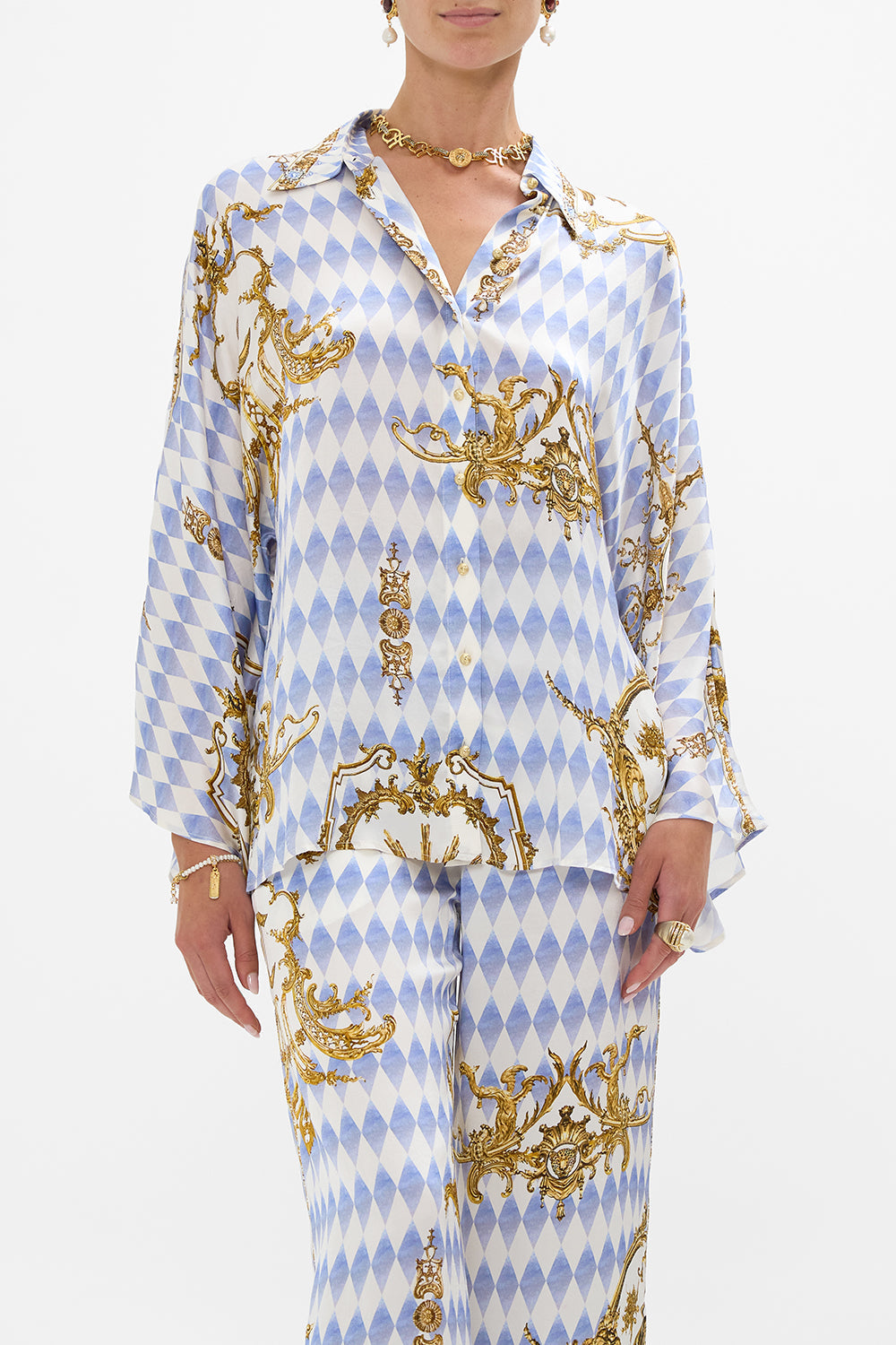 The CAMILLA WIDE SLEEVE BLOUSE THRONE GAMES in our  print.