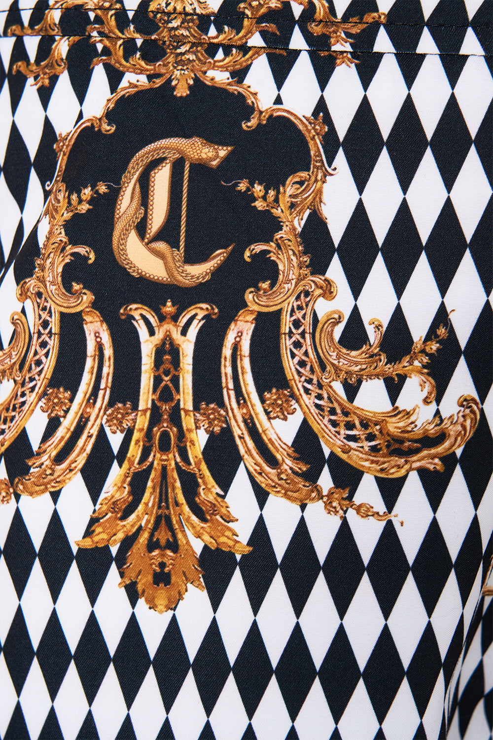 The CAMILLA MID LENGTH SWIM SHORT MONARCHY MANIA in our  print.