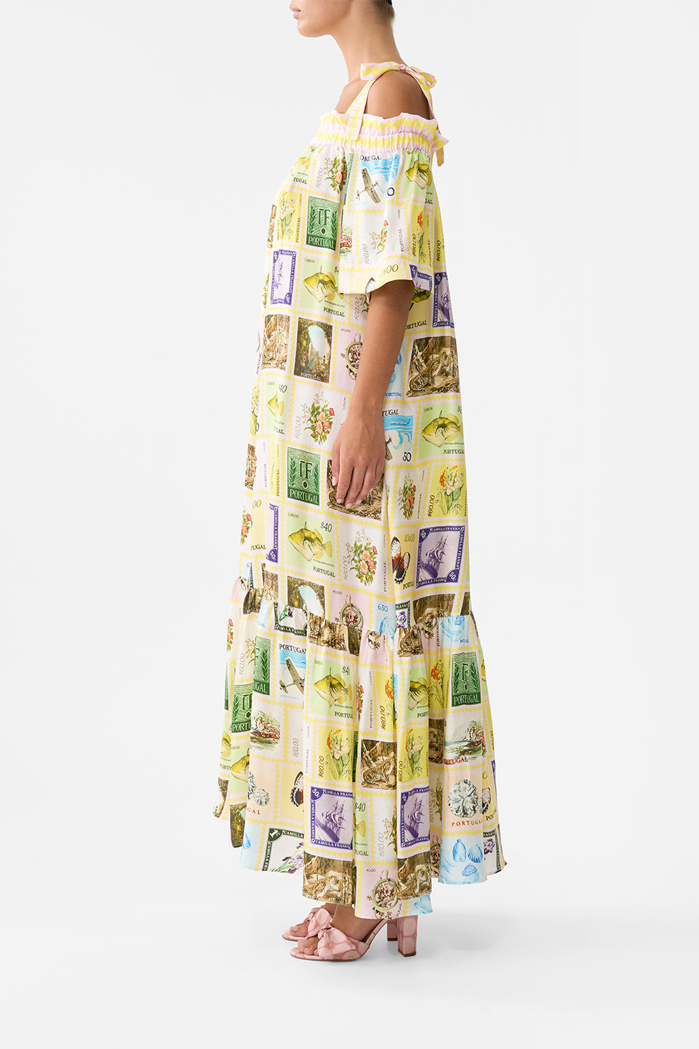 The CAMILLA LONG OFF SHOULDER FRILL DRESS WITH STRAPS WITH LOVE FROM LISBON in our  print.