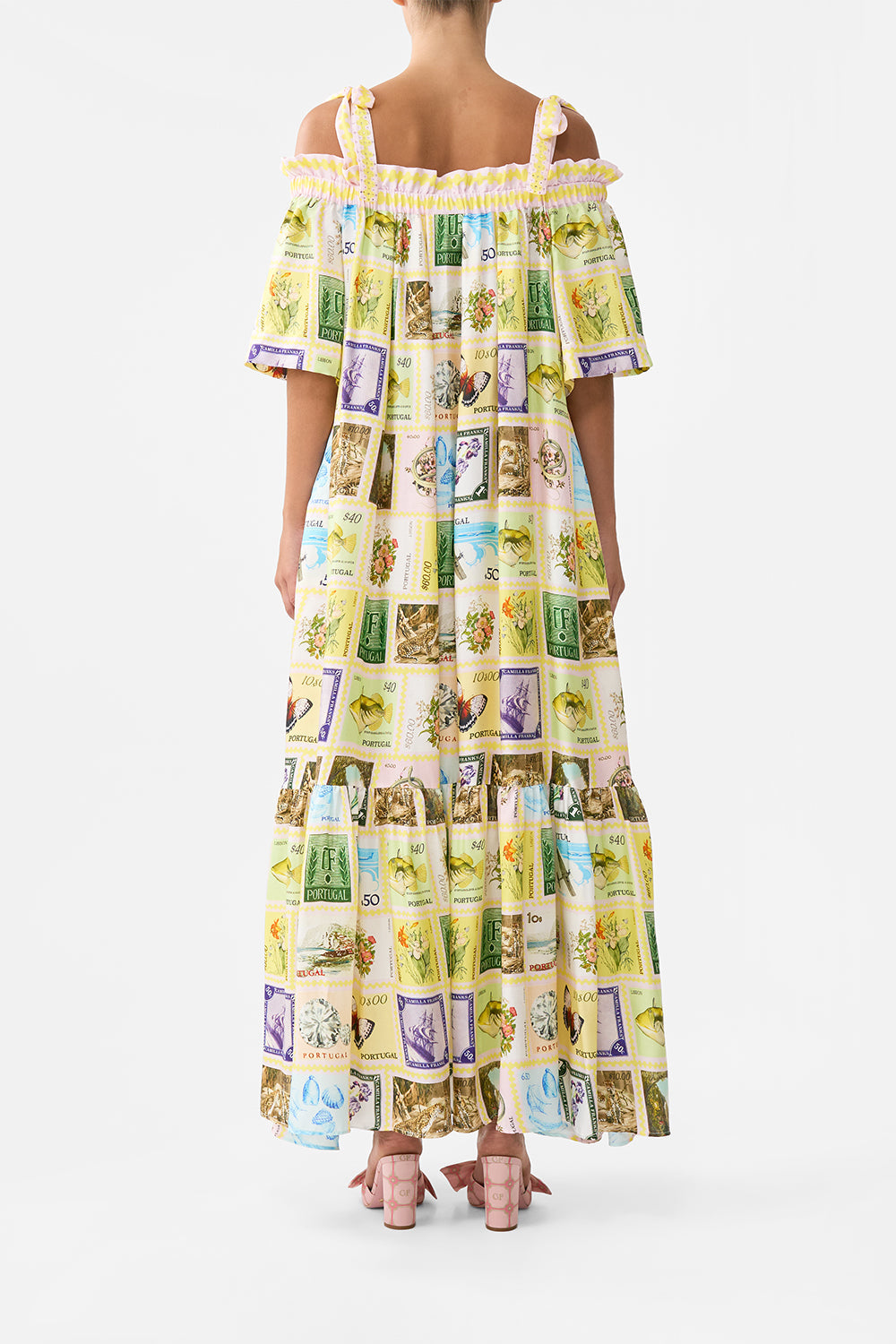 The CAMILLA LONG OFF SHOULDER FRILL DRESS WITH STRAPS WITH LOVE FROM LISBON in our  print.