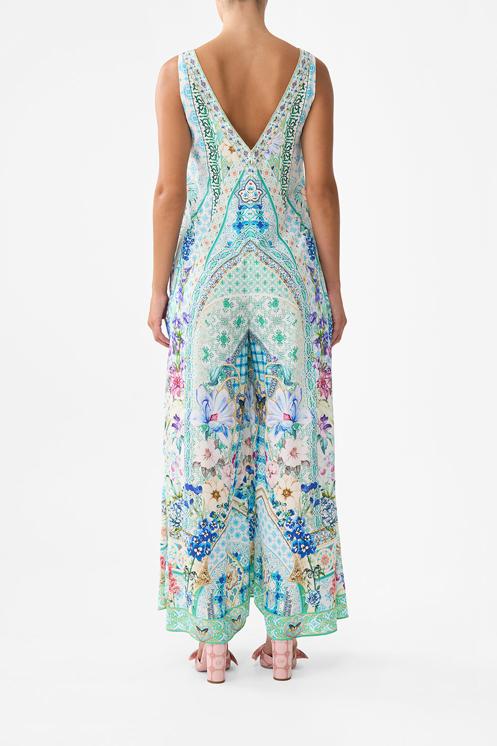 The CAMILLA V NECK FLARED JUMPSUIT SUNRISE IN SINTRA in our  print.