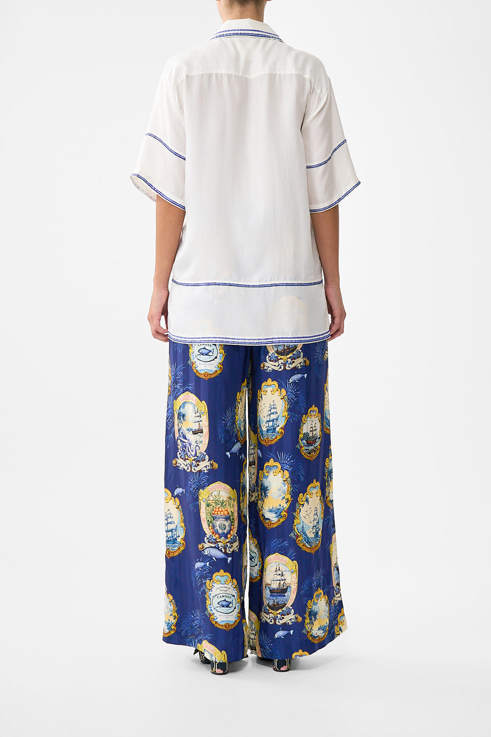 The CAMILLA OVERSIZED SHIRT SONG OF SAINT ANTHONY in our  print.
