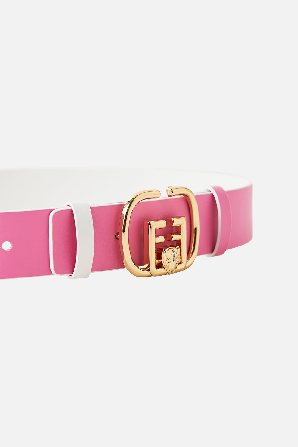 The CAMILLA REVERSIBLE MONOGRAM BUCKLE BELT SOLID PINK in our  print.