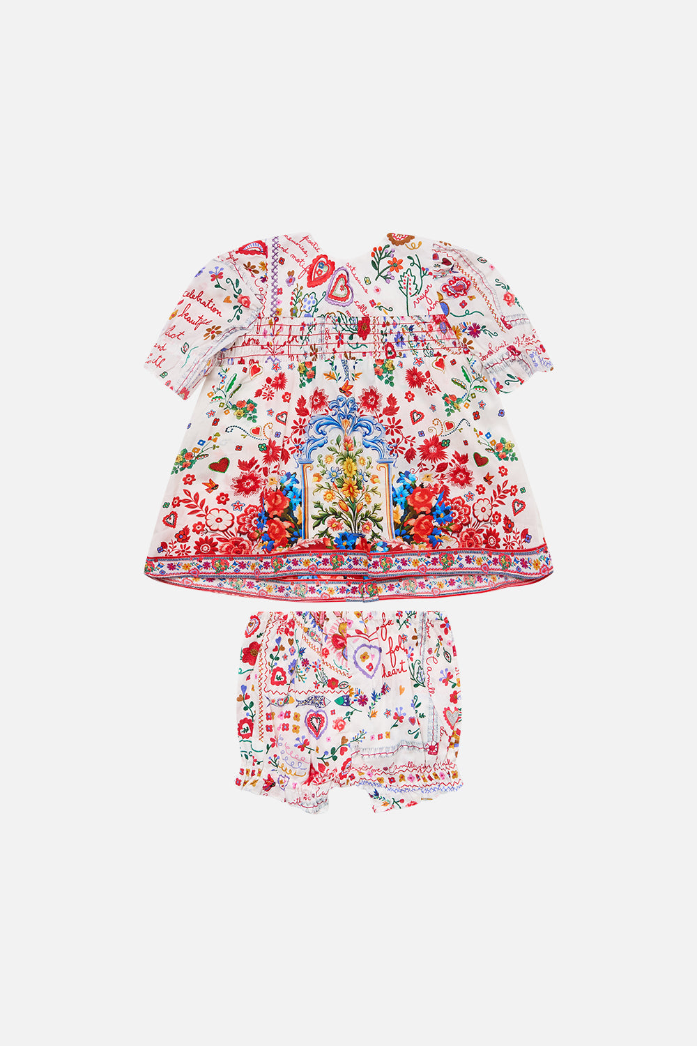 The CAMILLA BABIES PUFF SLEEVE TOP AND BLOOMER SET FAITH, LUCK & JUSTICE in our FAITH, LUCK & JUSTICE print.
