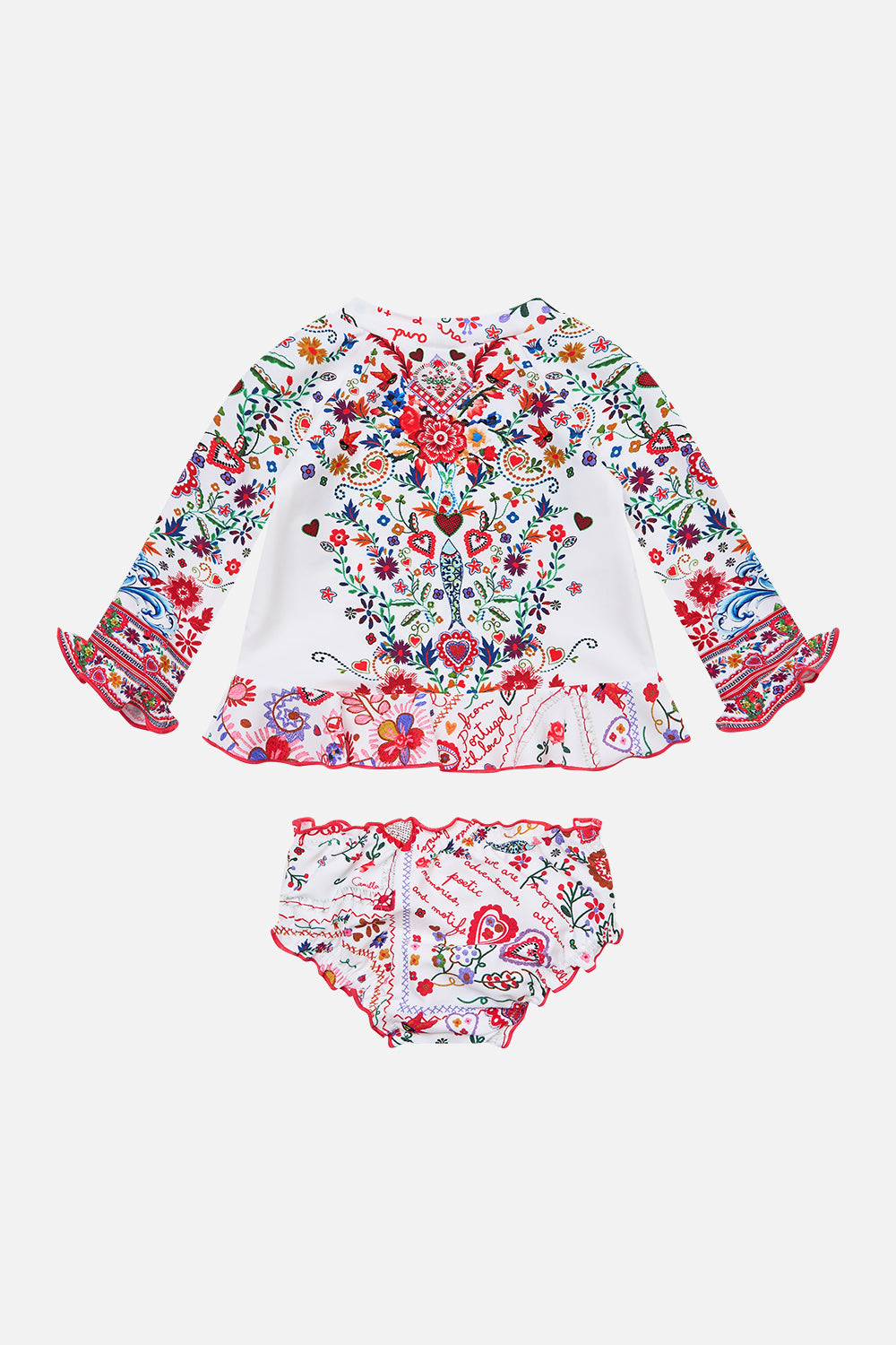The CAMILLA BABIES RASHIE SET WITH BABYLOCKED EDGES FAITH, LUCK & JUSTICE in our  print.