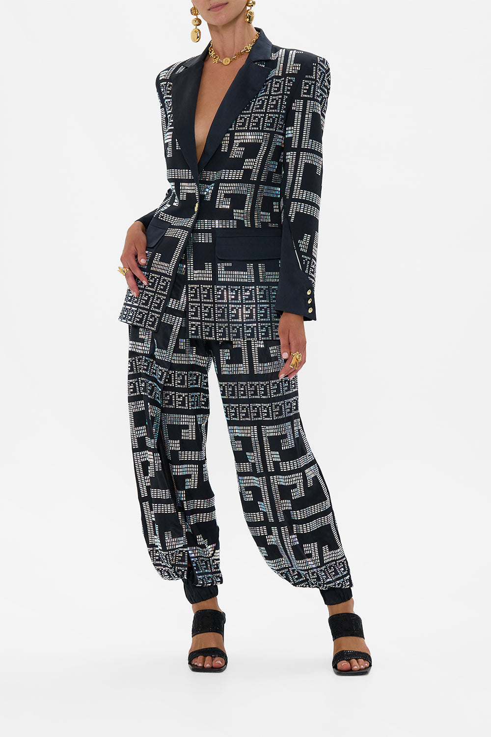 The CAMILLA JACKET WITH SLEEVE CUT OUT DETAIL READ MY GLYPHS in our READ MY GLYPHS print.