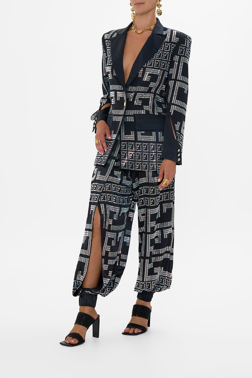 The CAMILLA JACKET WITH SLEEVE CUT OUT DETAIL READ MY GLYPHS in our  print.