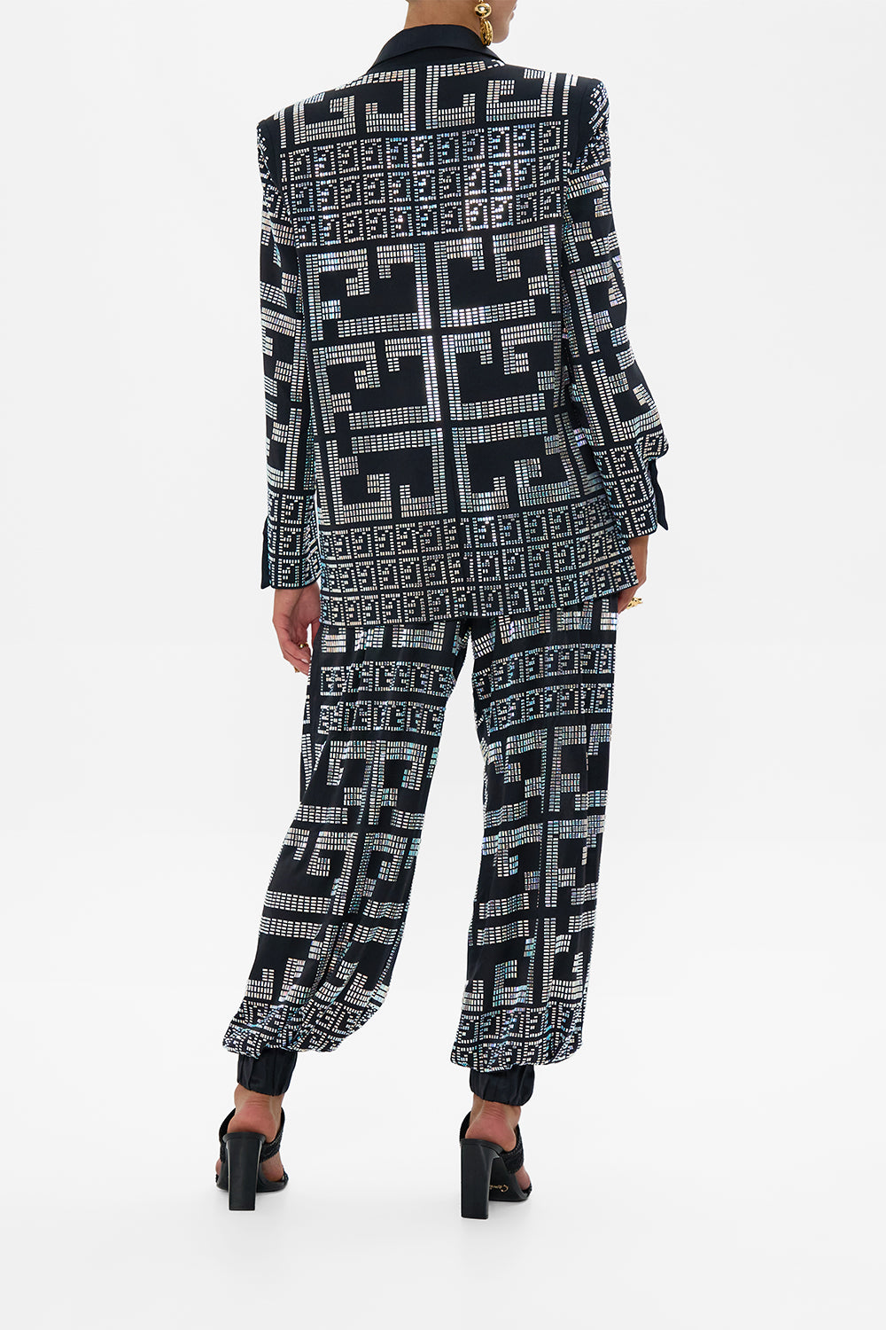 The CAMILLA JACKET WITH SLEEVE CUT OUT DETAIL READ MY GLYPHS in our  print.