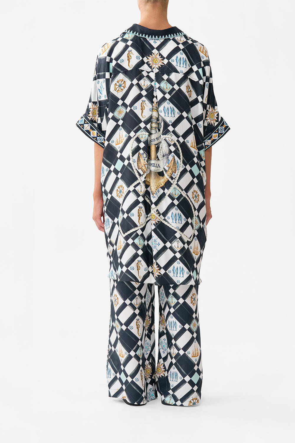The CAMILLA OVERSIZED POCKET TUNIC FOLK AFLOAT in our  print.