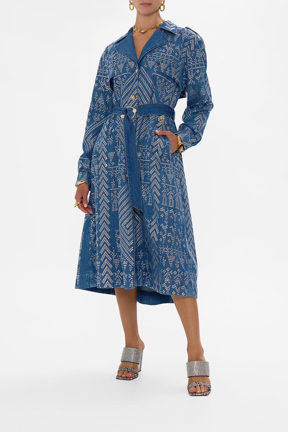 The CAMILLA DESERT REIGN LONGLINE BELTED TRENCH COAT DENIM in our  print.