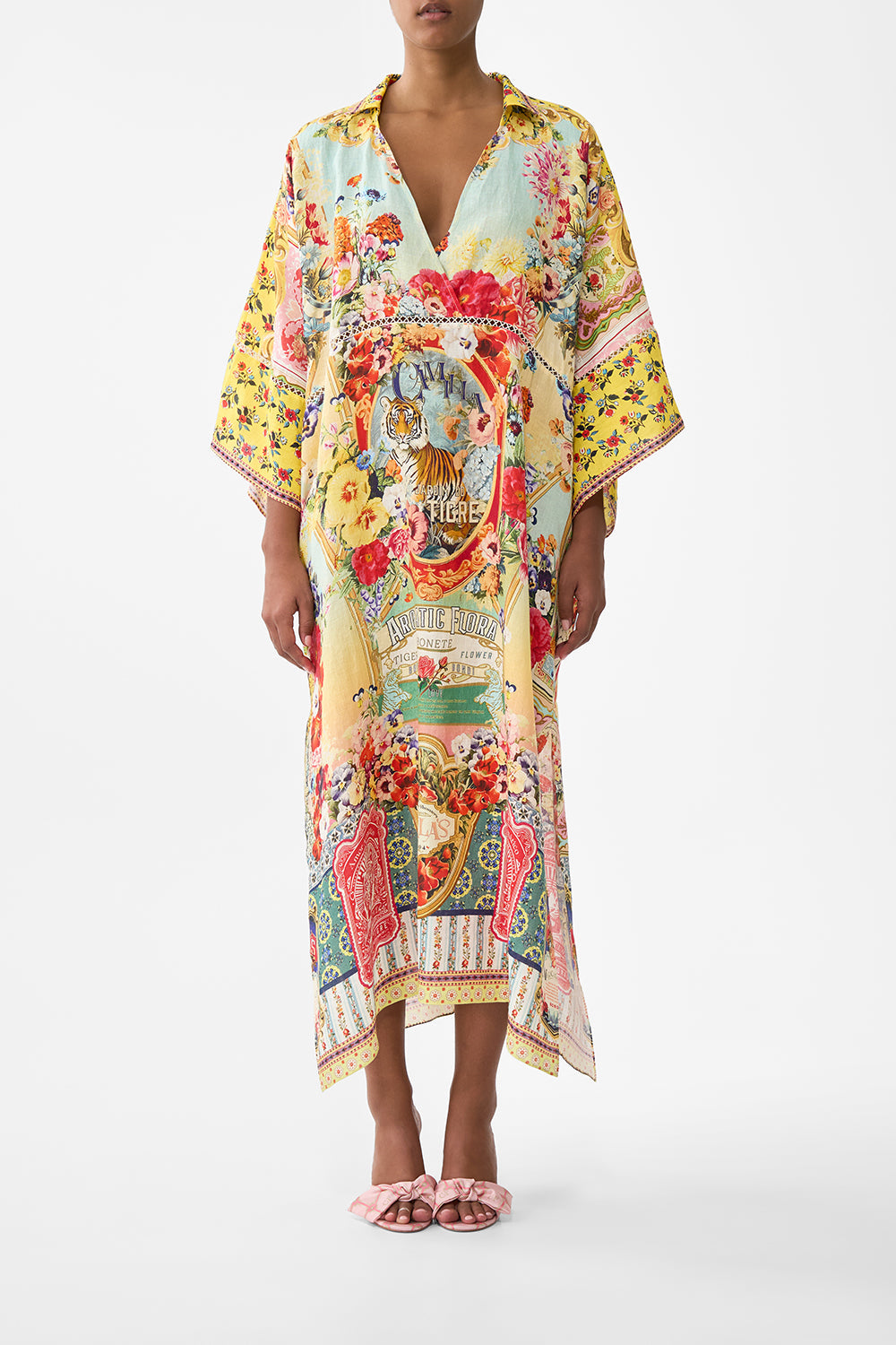 The CAMILLA DEEP V KAFTAN WITH CUT-OUT DETAIL AROMATIC TIGER FLOWER in our AROMATIC TIGER FLOWER print.