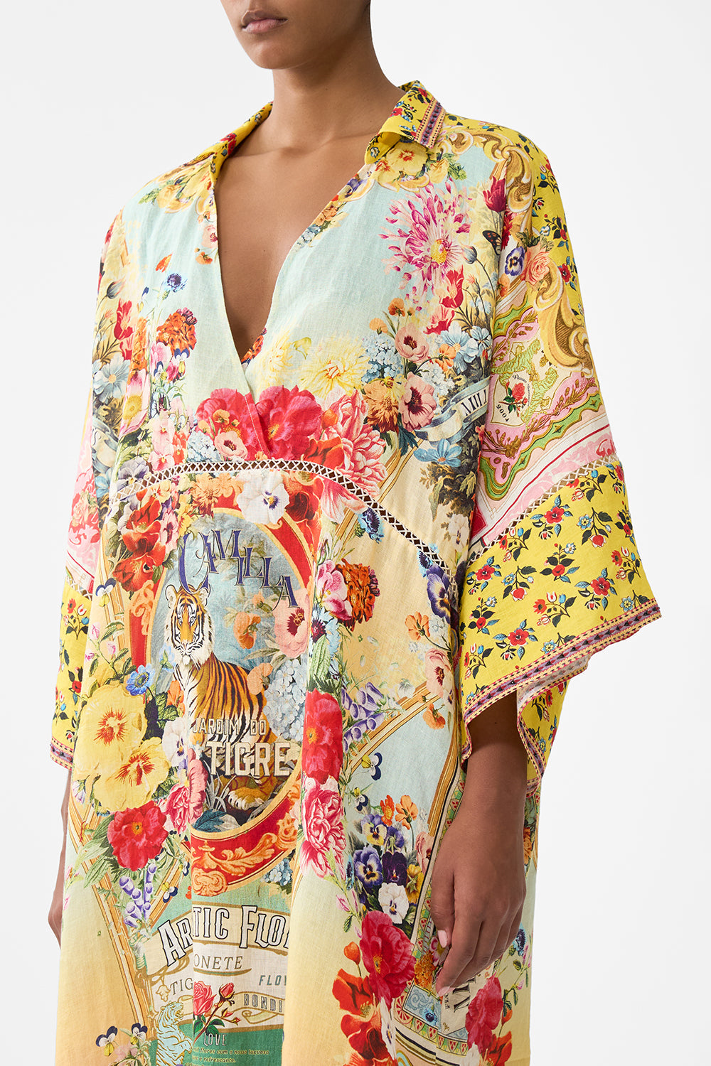 The CAMILLA DEEP V KAFTAN WITH CUT-OUT DETAIL AROMATIC TIGER FLOWER in our  print.