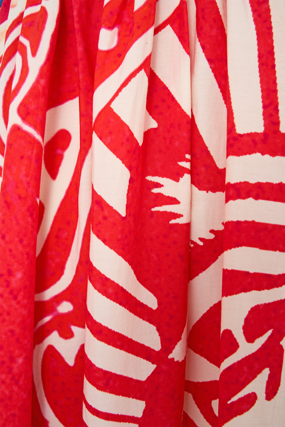 The CAMILLA Ruffle Hem Halter Dress in our Rinse & Roar print.