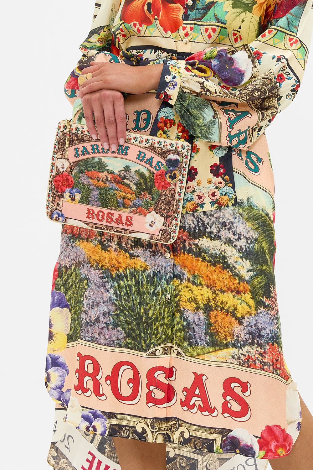 The CAMILLA Small Canvas Clutch in our Aromatic Amor print.