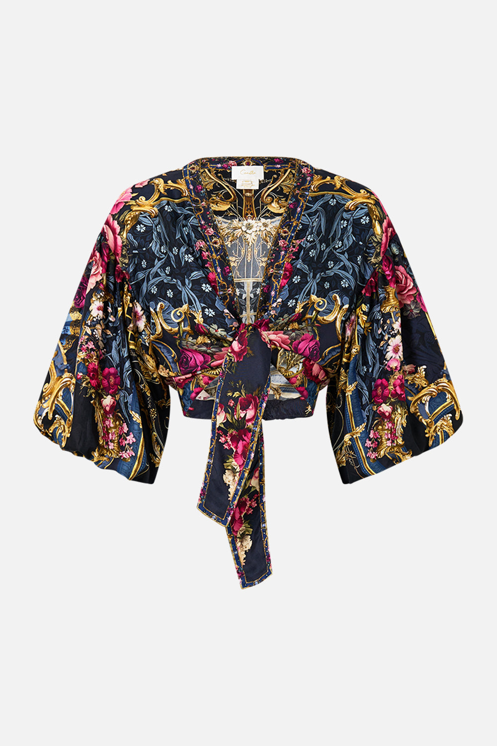 The CAMILLA TIE FRONT PUFF SLEEVE TOP ORNATE ON A PLATE in our  print.