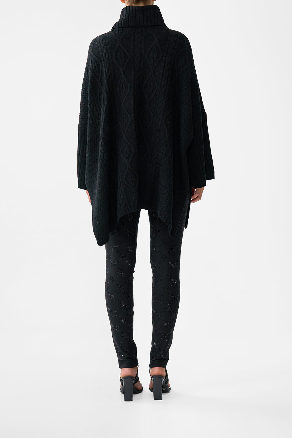 The CAMILLA Roll Neck Knit Jumper in our Solid Black print.