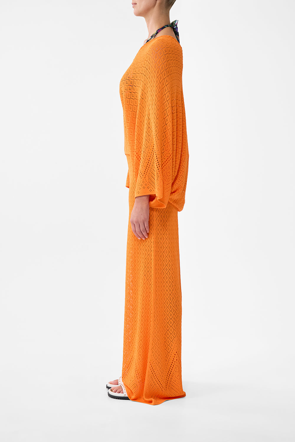 The CAMILLA RELAXED V NECK KNIT TOP BASKED IN BAROQUE in our  print.