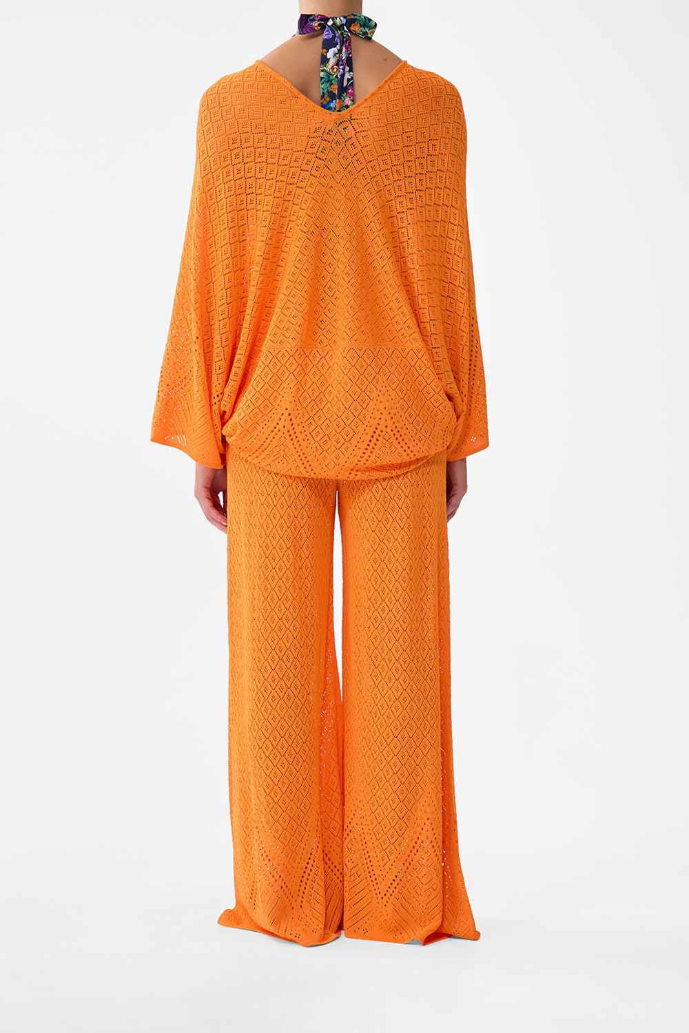 The CAMILLA RELAXED V NECK KNIT TOP BASKED IN BAROQUE in our  print.
