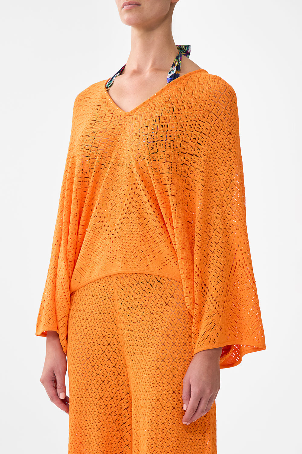 The CAMILLA RELAXED V NECK KNIT TOP BASKED IN BAROQUE in our  print.