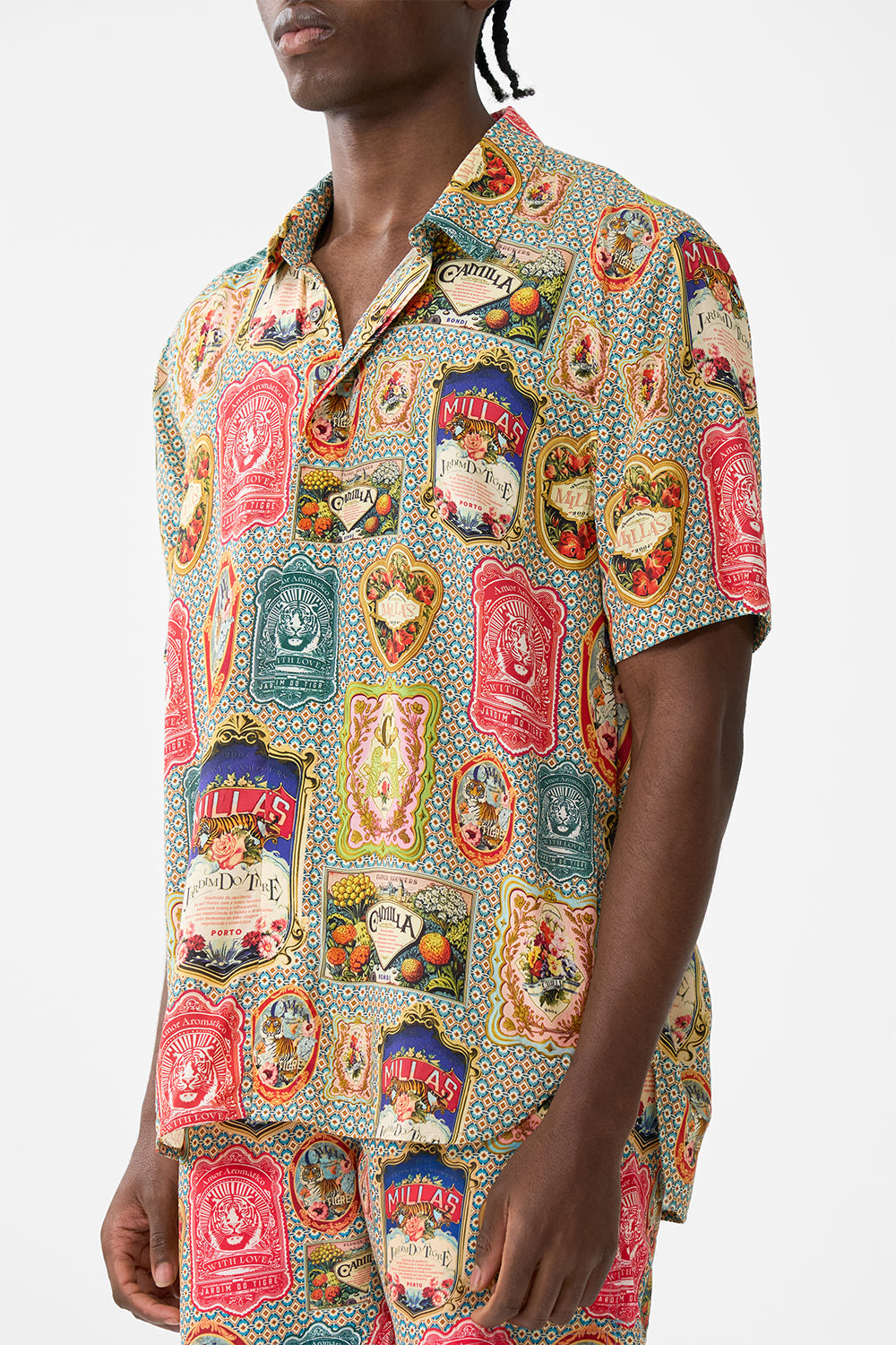 The CAMILLA SHORT SLEEVE OVERSIZED SHIRT SOAP OPERA in our  print.