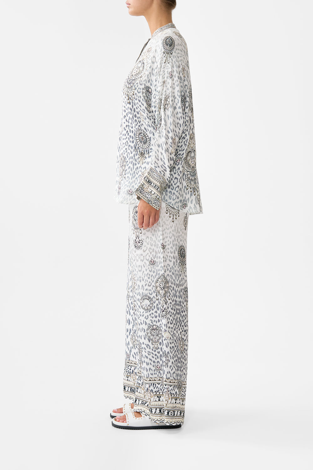 The CAMILLA RELAXED PLACKET DETAIL SHIRT MARBLE HEAVEN in our  print.