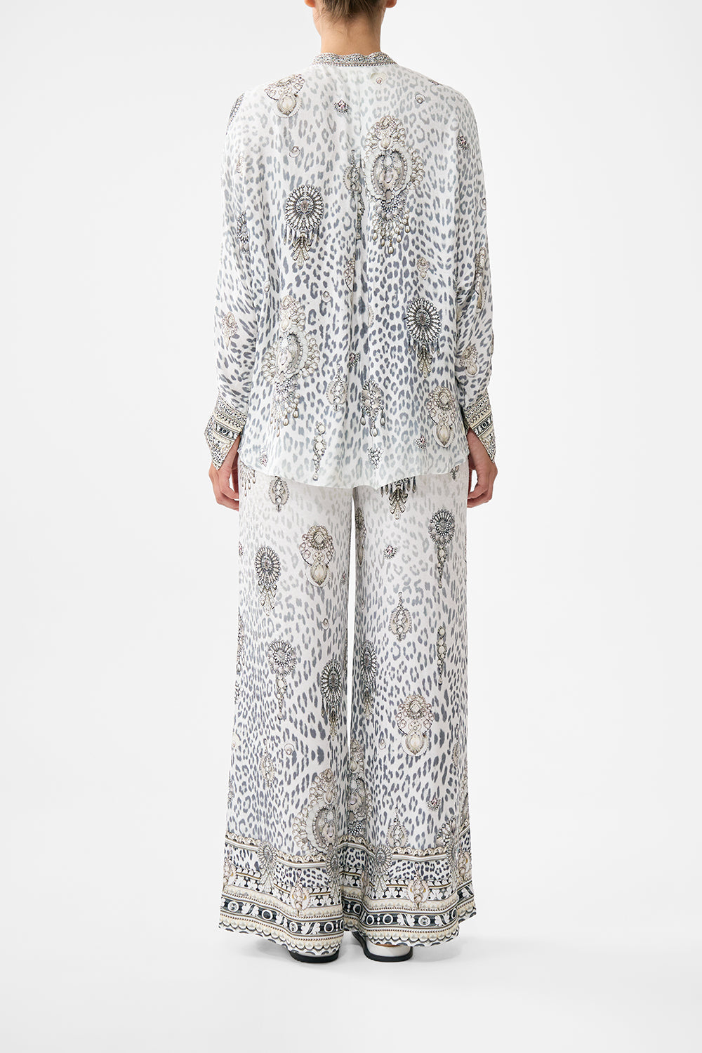 The CAMILLA RELAXED PLACKET DETAIL SHIRT MARBLE HEAVEN in our  print.