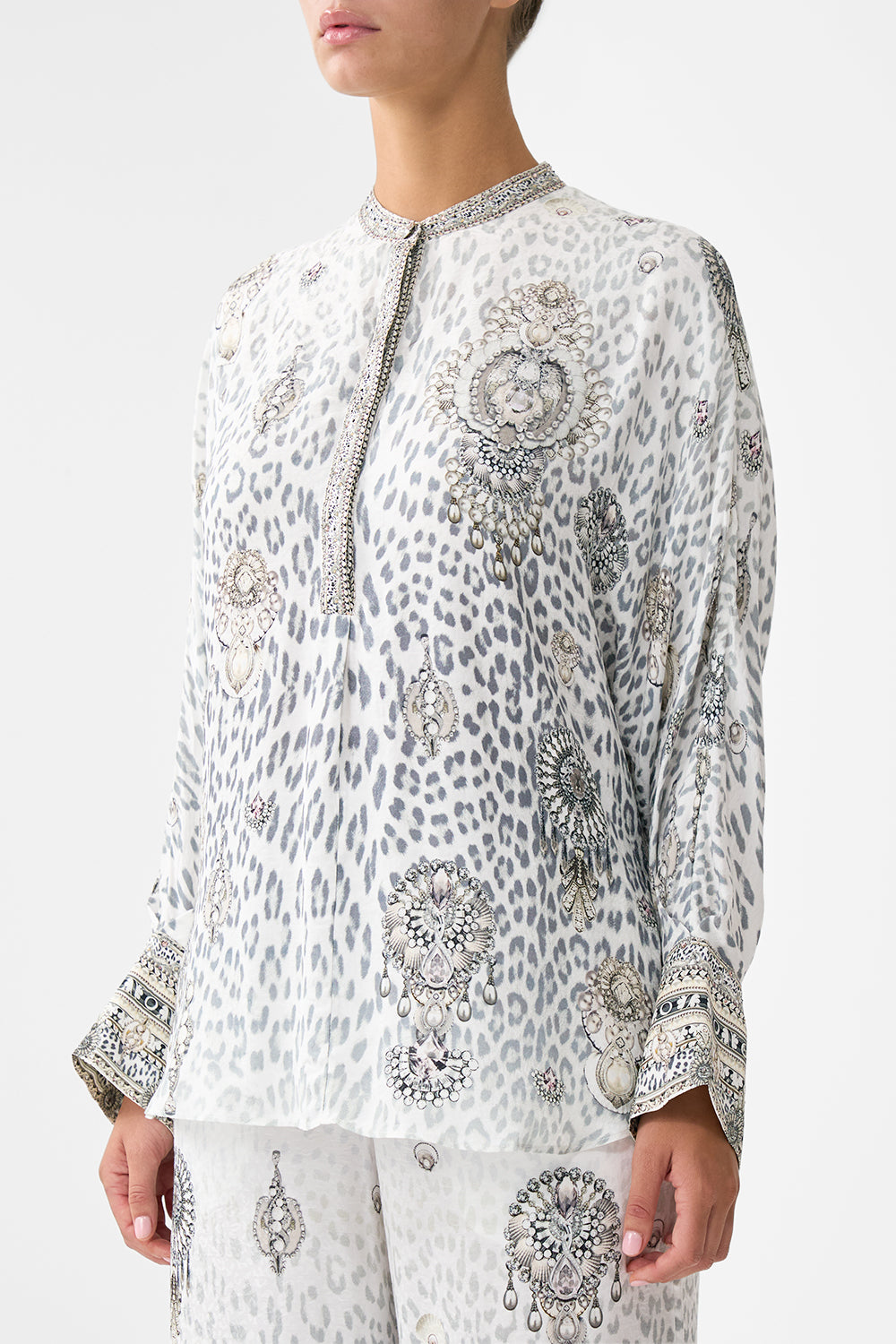 The CAMILLA RELAXED PLACKET DETAIL SHIRT MARBLE HEAVEN in our  print.