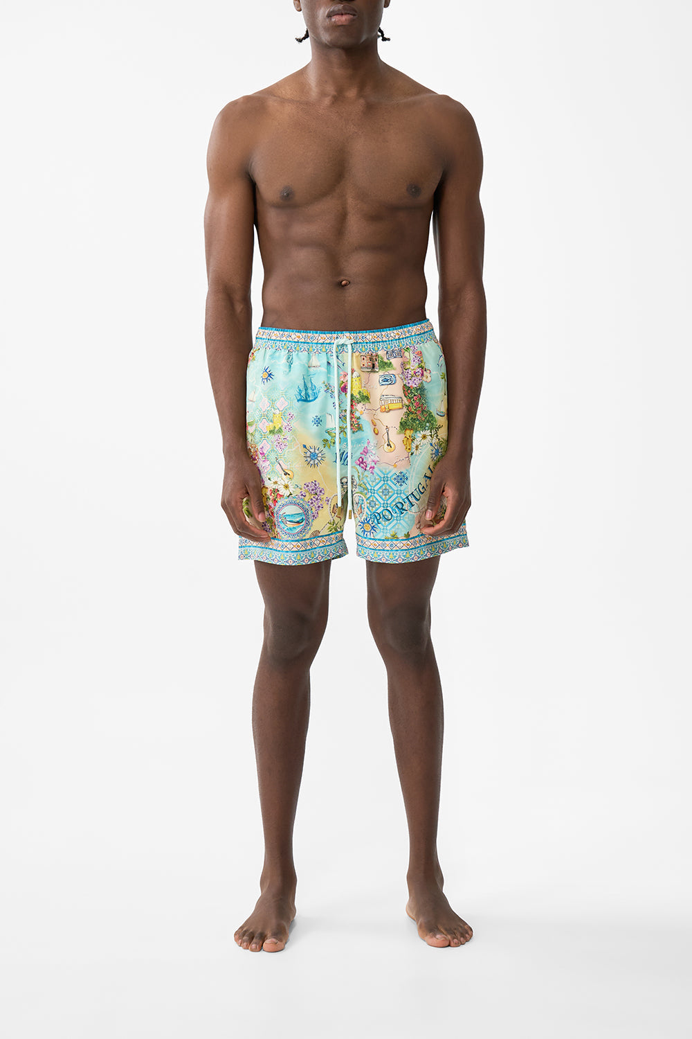 The CAMILLA MID LENGTH BOARDSHORT WITH ELASTIC WAIST JUST COASTING in our JUST COASTING print.