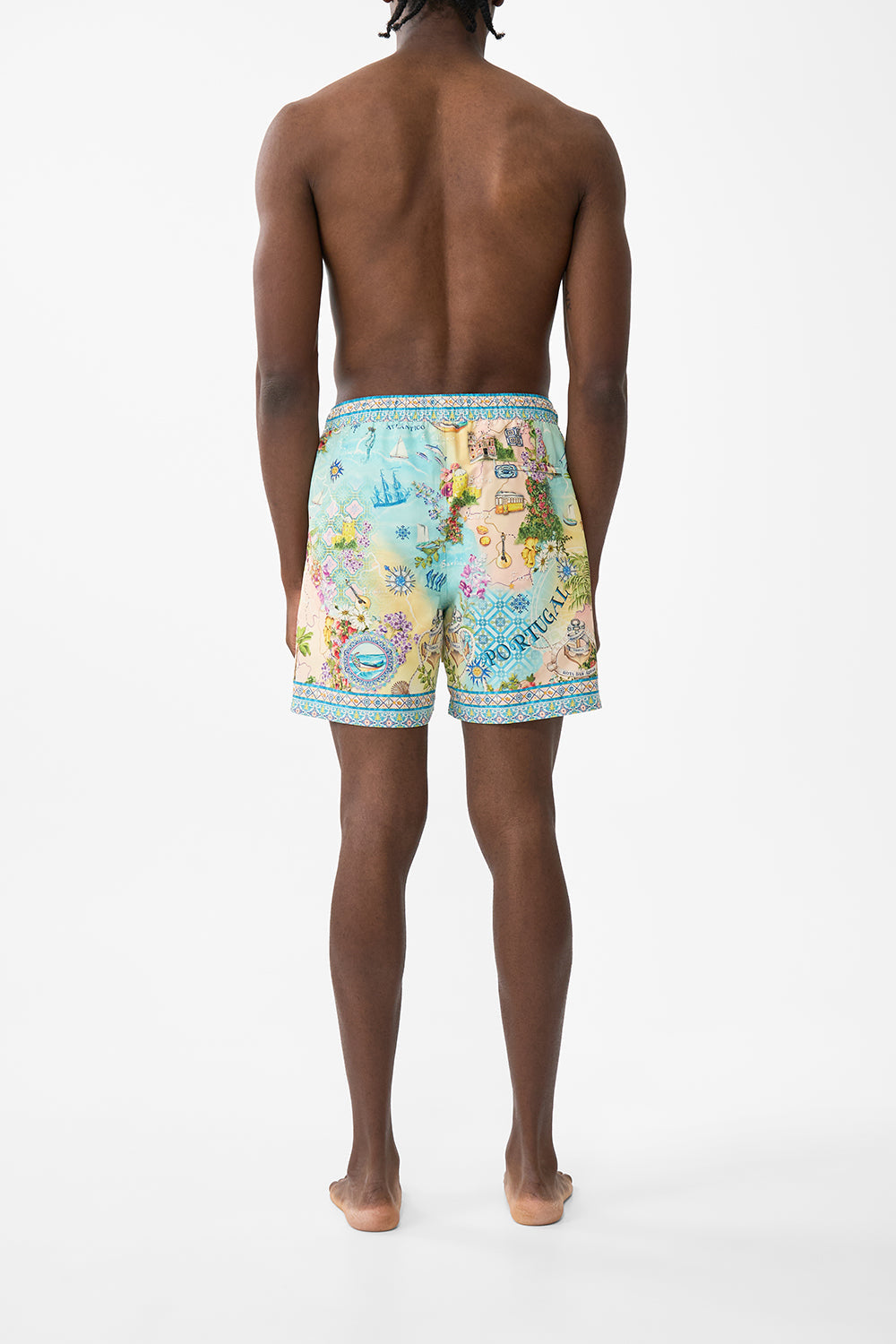 The CAMILLA MID LENGTH BOARDSHORT WITH ELASTIC WAIST JUST COASTING in our  print.