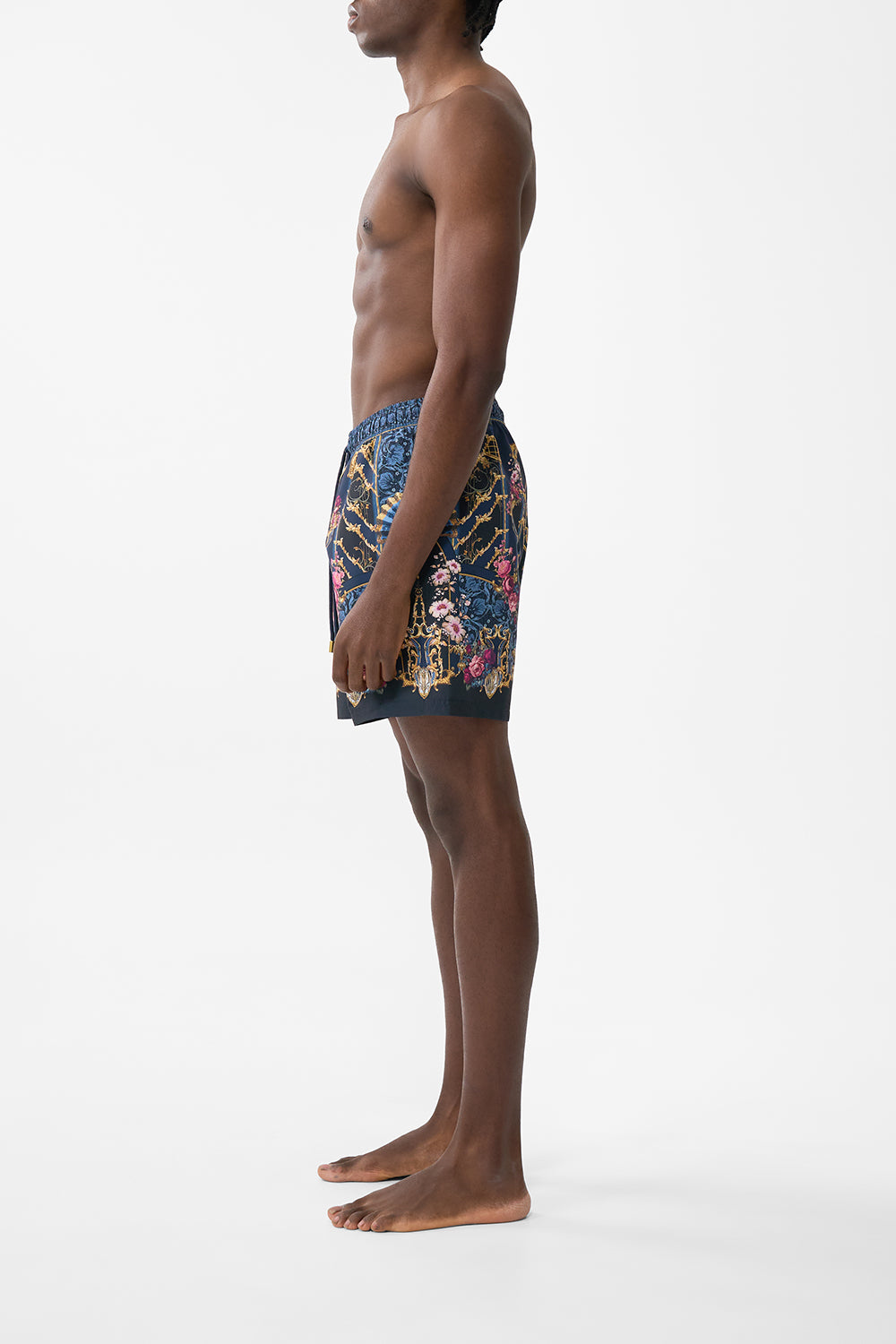 The CAMILLA MID LENGTH BOARDSHORT WITH ELASTIC WAIST ORNATE ON A PLATE in our  print.