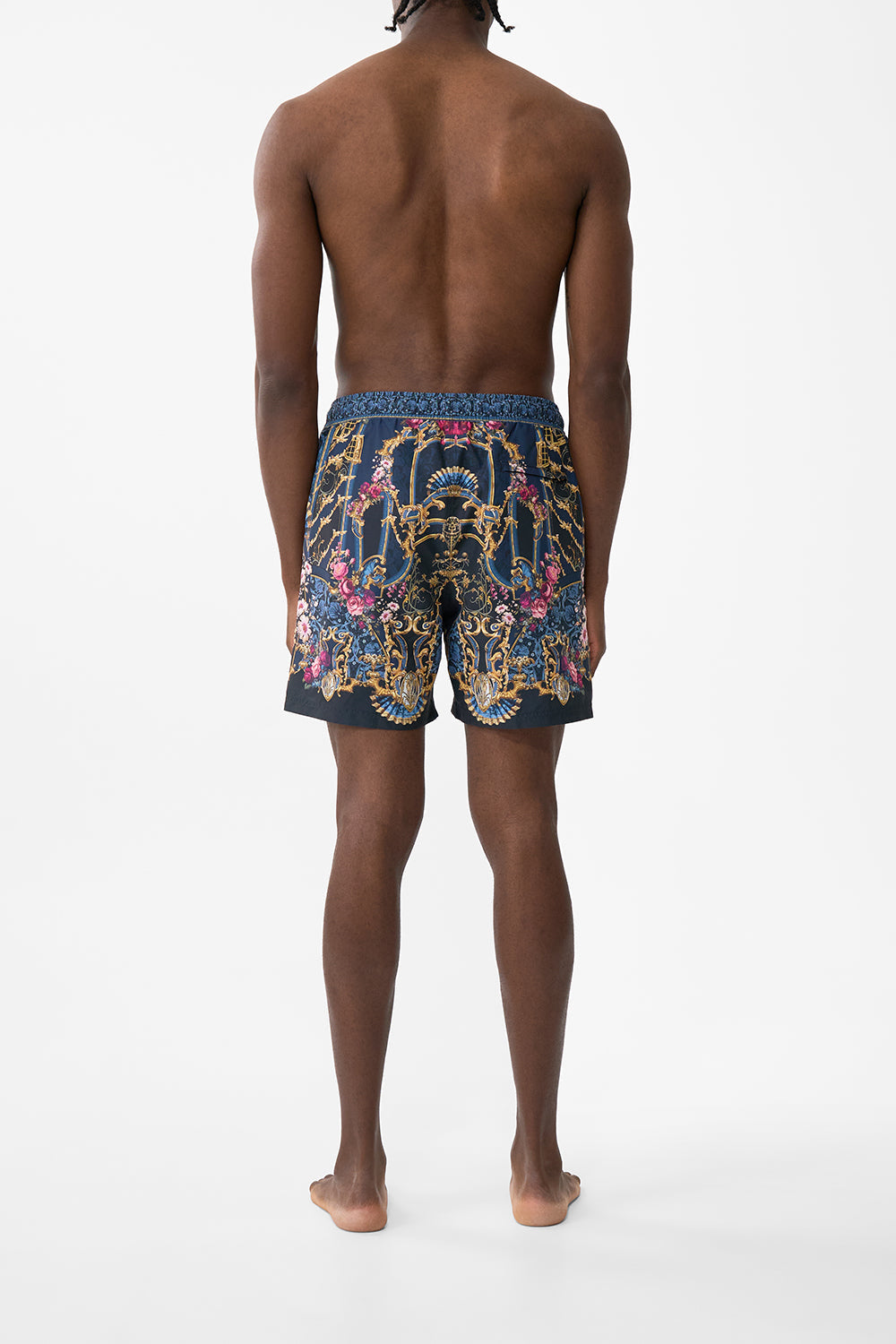 The CAMILLA MID LENGTH BOARDSHORT WITH ELASTIC WAIST ORNATE ON A PLATE in our  print.