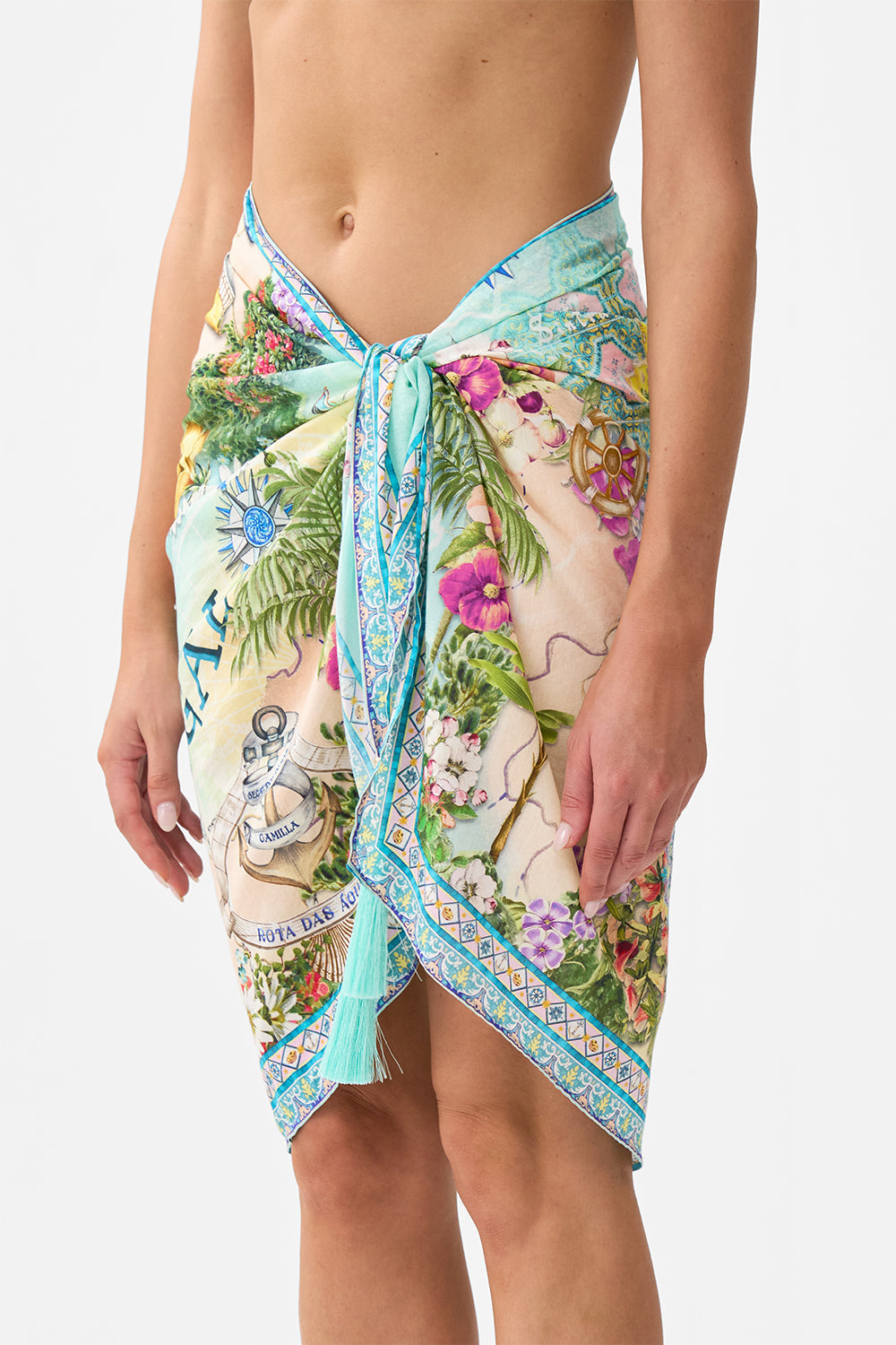 The CAMILLA Woven Short Sarong With Tassels in our Just Coasting print.