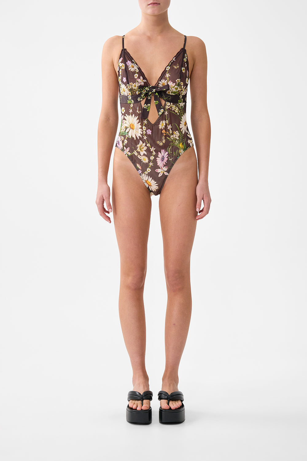 The CAMILLA SCALLOPED EDGE TRIANGLE BODYSUIT WITH BOW FRONT DISH IT, DAISY in our  print.