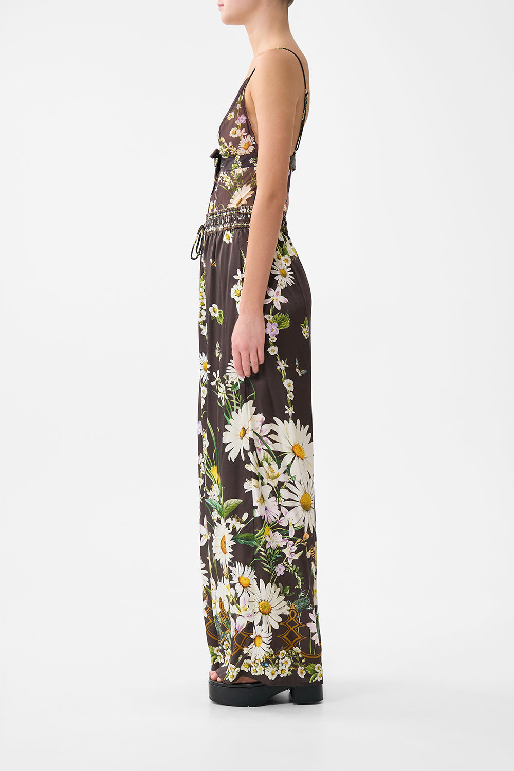 The CAMILLA SCALLOPED EDGE TRIANGLE BODYSUIT WITH BOW FRONT DISH IT, DAISY in our  print.