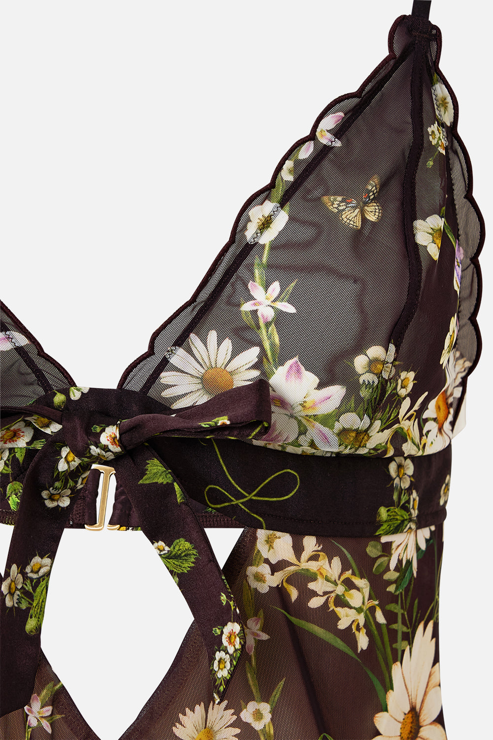 The CAMILLA SCALLOPED EDGE TRIANGLE BODYSUIT WITH BOW FRONT DISH IT, DAISY in our  print.
