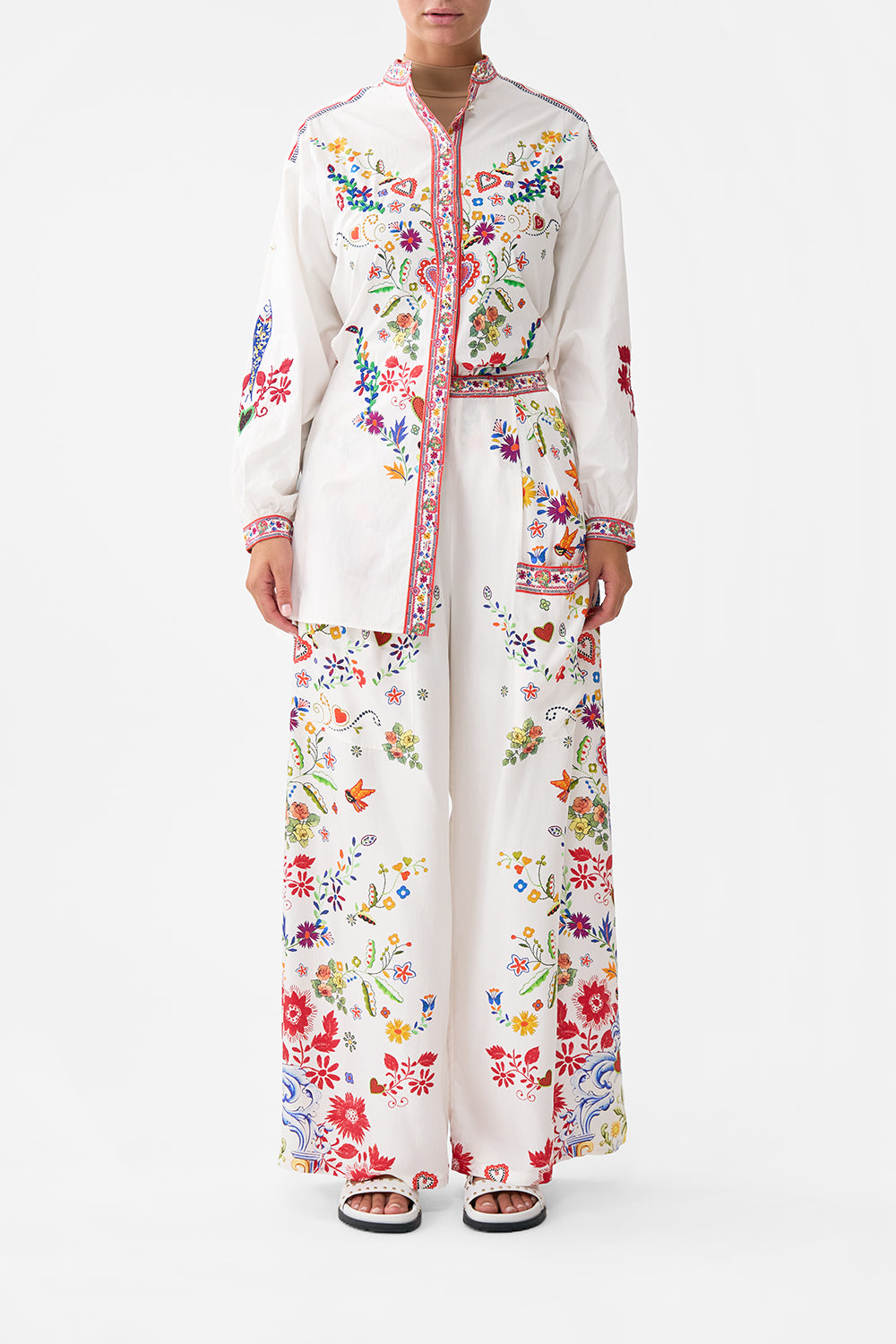 The CAMILLA WIDE LEG TROUSER WITH FRONT POCKETS FAITH, LUCK & JUSTICE in our  print.