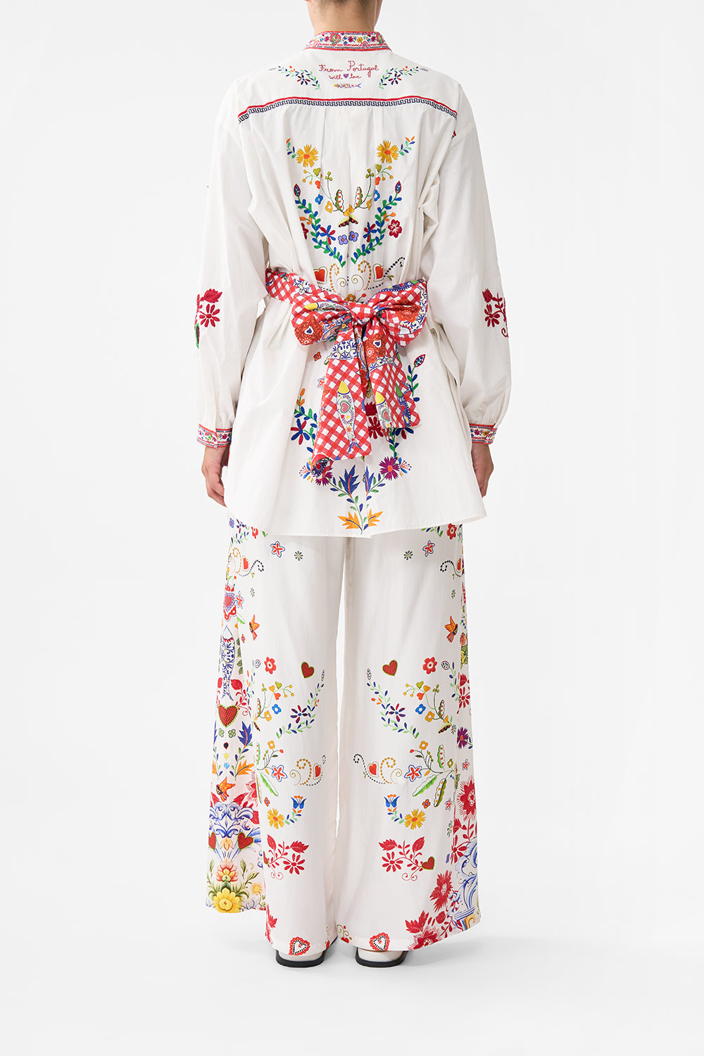 The CAMILLA WIDE LEG TROUSER WITH FRONT POCKETS FAITH, LUCK & JUSTICE in our  print.