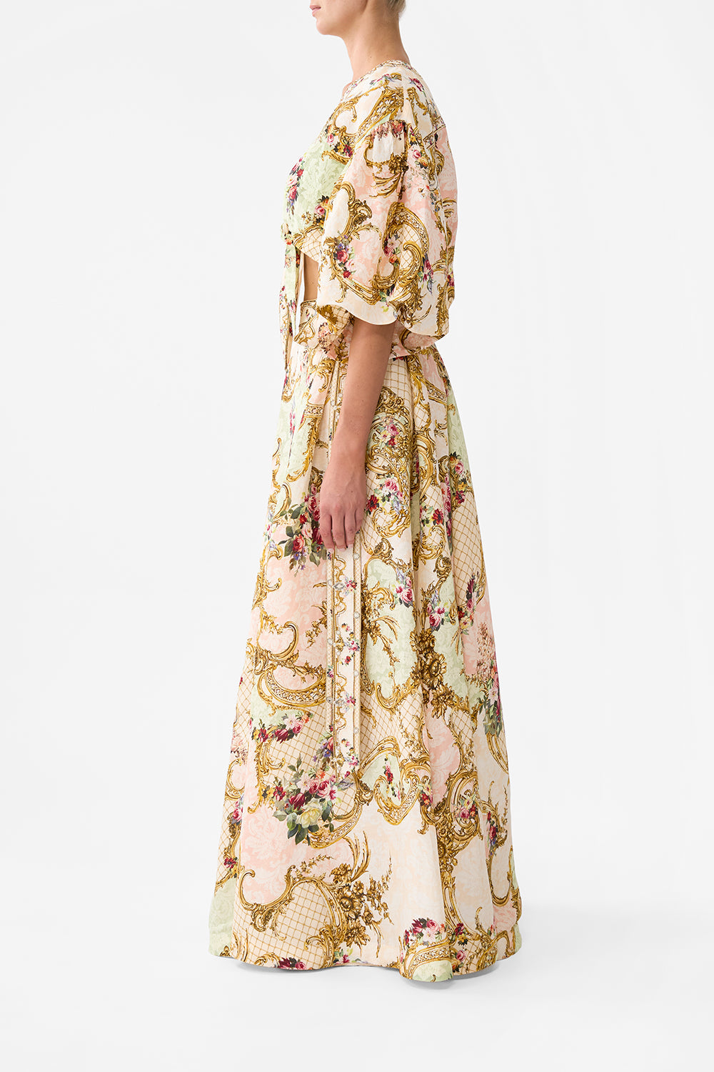 The CAMILLA TIE FRONT PUFF SLEEVE TOP THE QUEENS QUARTERS in our  print.
