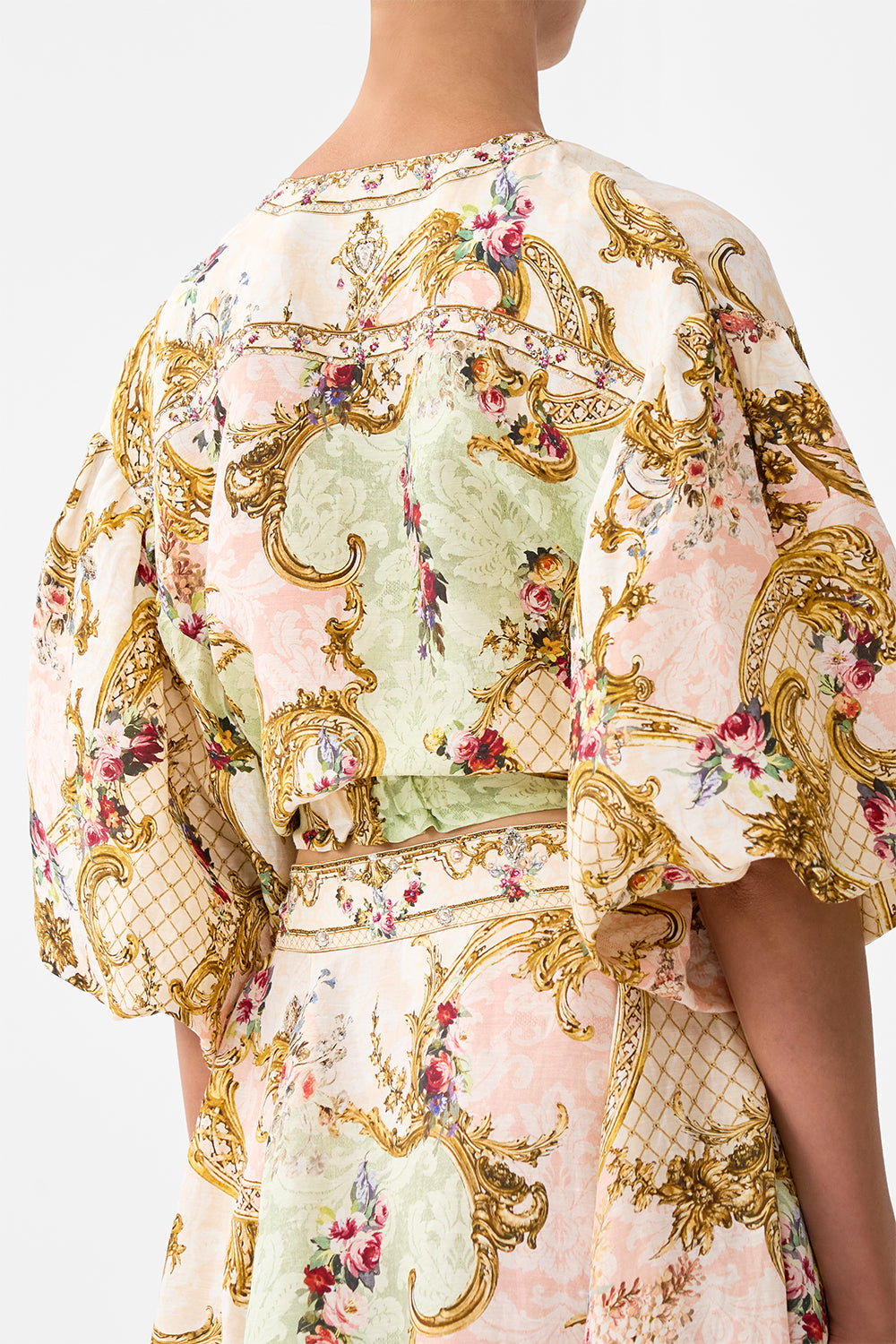 The CAMILLA TIE FRONT PUFF SLEEVE TOP THE QUEENS QUARTERS in our  print.