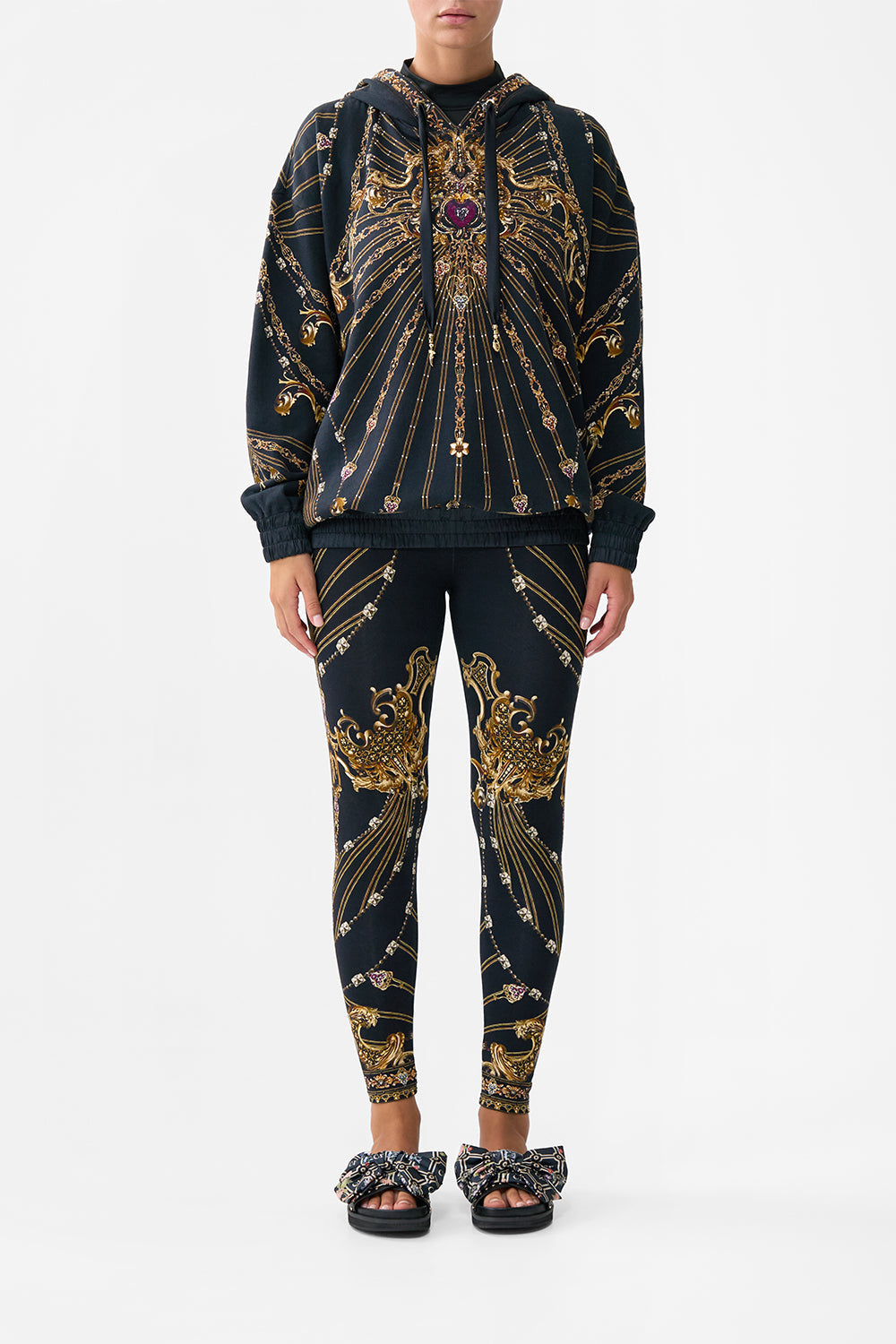The CAMILLA SILK BAND OVERSIZED HOODIE WITH POCKETS BAROQUE AROUND THE CLOCK in our  print.