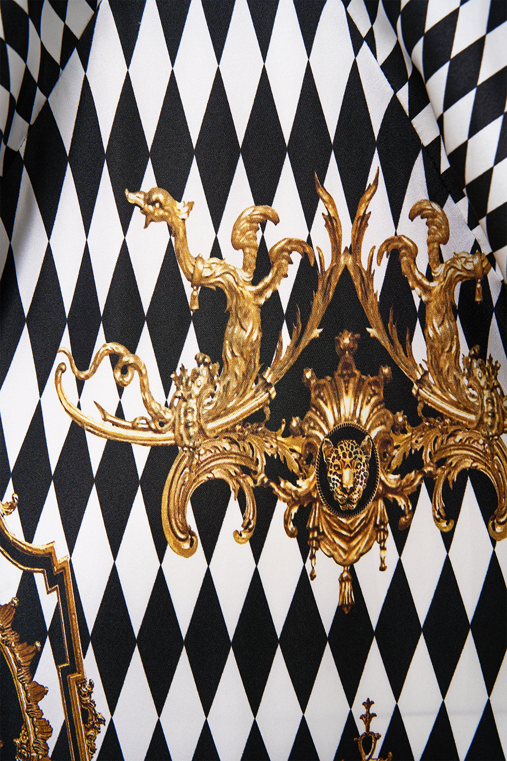 The CAMILLA PLUNGE NECK DRAPED SHOULDER DRESS MONARCHY MANIA in our  print.