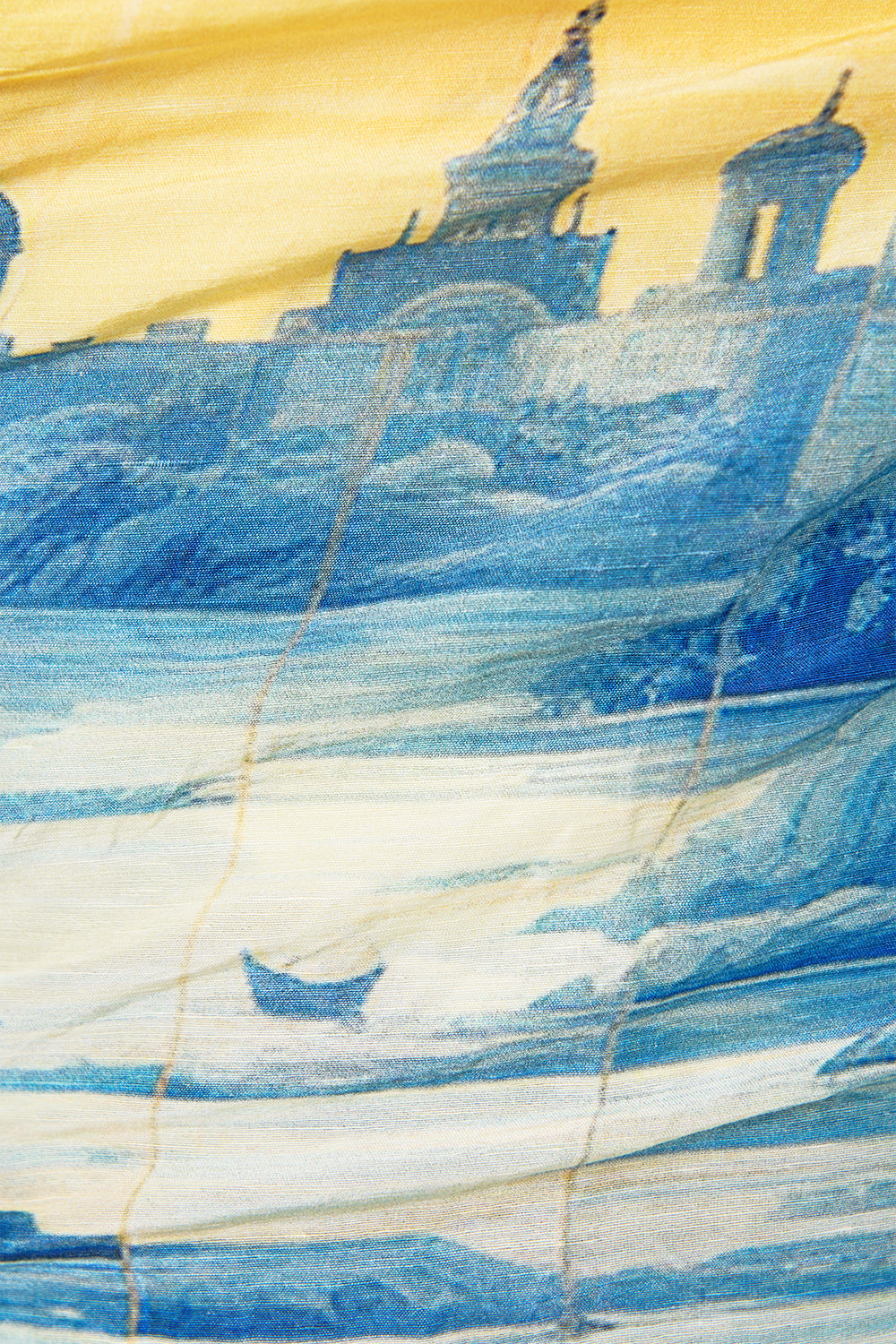 The CAMILLA CROPPED WRAP SHIRT SONG OF SAINT ANTHONY in our  print.