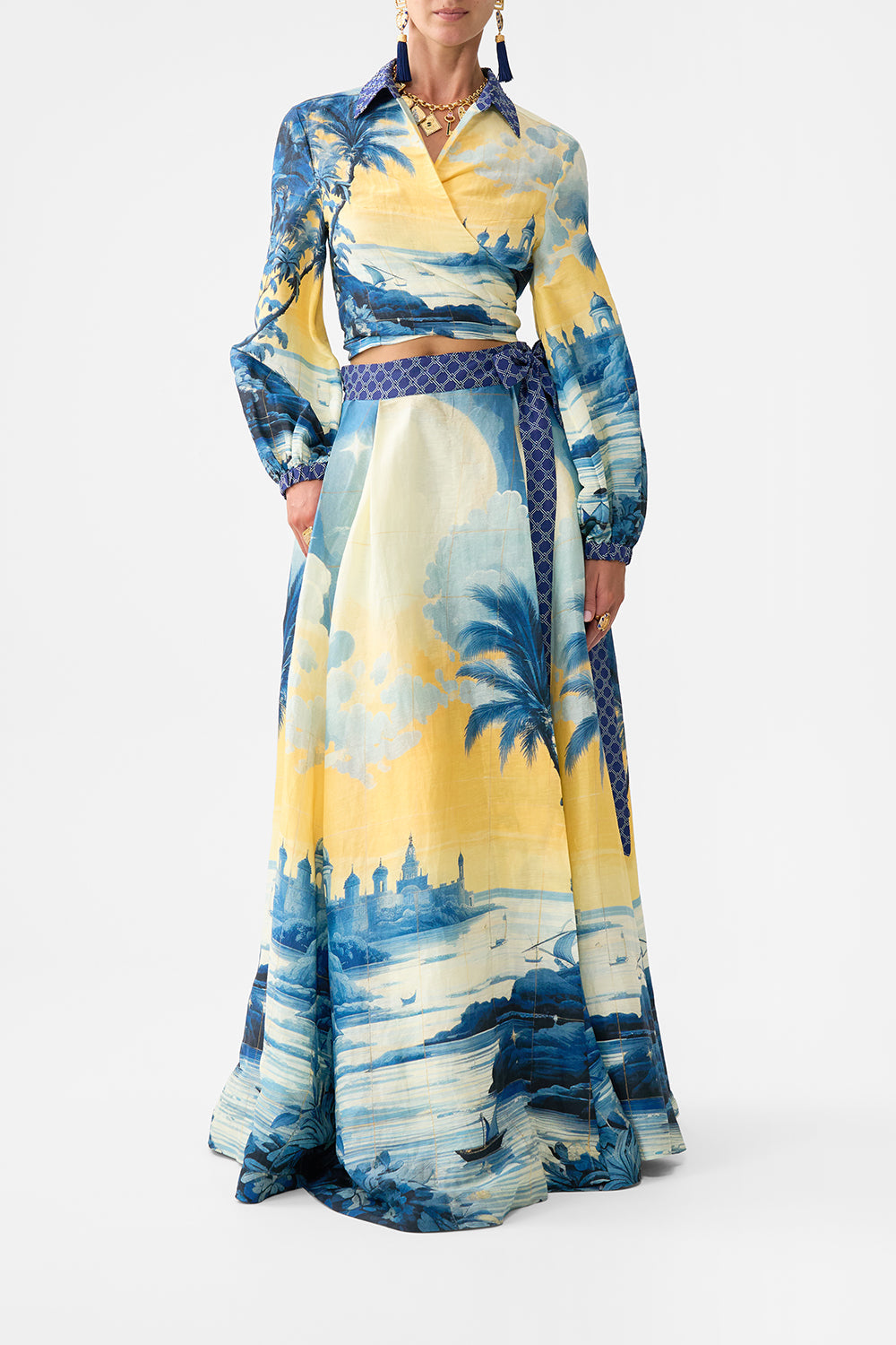 The CAMILLA CROPPED WRAP SHIRT SONG OF SAINT ANTHONY in our SONG OF SAINT ANTHONY print.