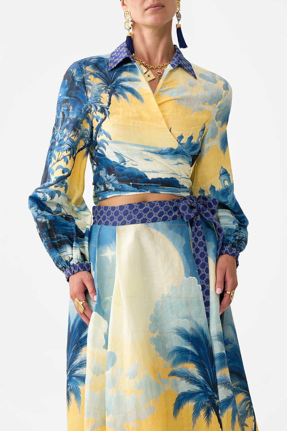 The CAMILLA CROPPED WRAP SHIRT SONG OF SAINT ANTHONY in our  print.