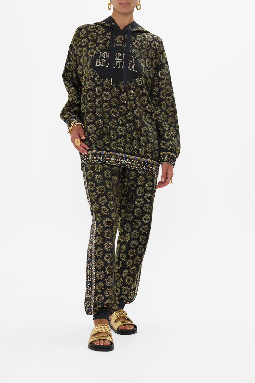 The CAMILLA SILK BAND OVERSIZED HOODIE WITH POCKETS DEFY GRAVITY in our DEFY GRAVITY print.