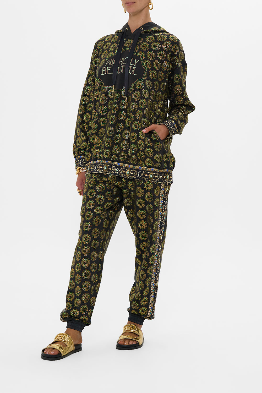 The CAMILLA SILK BAND OVERSIZED HOODIE WITH POCKETS DEFY GRAVITY in our  print.