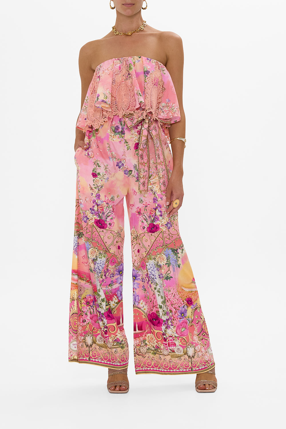 The CAMILLA STRAPLESS JUMPSUIT WITH FRILL TOTALLY OZMOPOLITAN in our TOTALLY OZMOPOLITAN print.